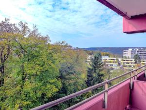 a balcony with a view of trees and buildings at Apartment B610 by Interhome in Lahnstein