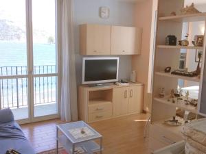 A television and/or entertainment centre at Apartment Franco by Interhome Még 20 kép