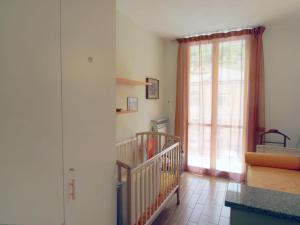 A bed or beds in a room at Apartment Franco by Interhome