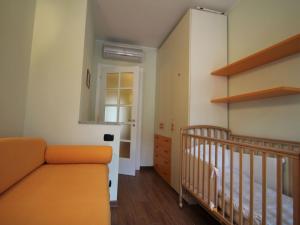 A bed or beds in a room at Apartment Franco by Interhome