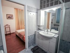 A bathroom at Apartment Franco by Interhome