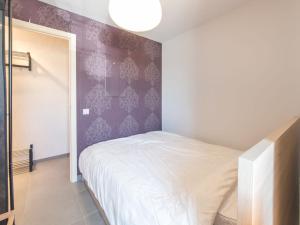 Ένα ή περισσότερα κρεβάτια σε δωμάτιο στο Apartment Vosseslag I sunny apartment by Interhome