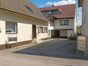 a house with a sign in front of it at Holiday Home Roth by Interhome in Neuried