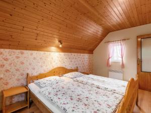 Postel nebo postele na pokoji v ubytování Holiday Home Horní Věstonice by Interhome