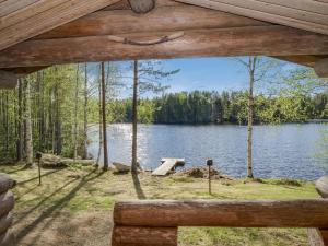 a view of a lake from a cabin at Holiday Home Papanmökki by Interhome in Huuhanaho