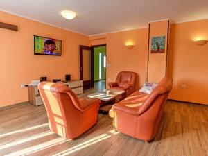 a waiting room with two chairs and a table at Holiday Home Dante by Interhome in Marčelji