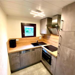 Kuchyň nebo kuchyňský kout v ubytování Ferienwohnung Vogel