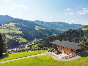 an aerial view of a house in the mountains at Apartment Chalet Edelweiß - WIL001 by Interhome in Auffach