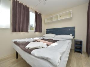 Posteľ alebo postele v izbe v ubytovaní Holiday Home Palma-3 by Interhome