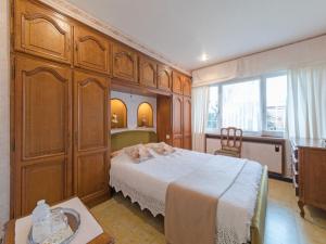 Ένα ή περισσότερα κρεβάτια σε δωμάτιο στο Holiday Home Villa Martinella by Interhome