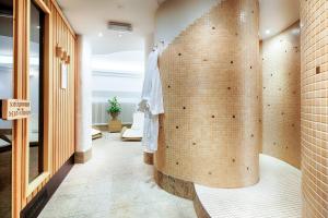 a hallway with a wall of brick at Hotel Villa Geyerswörth in Bamberg +47 photos