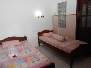 Letto o letti in una camera di Fortuna Guest House