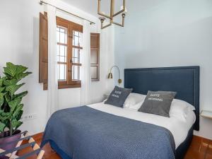 Postel nebo postele na pokoji v ubytování limehome Granada Calle Santa Ana
