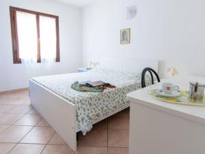 A bed or beds in a room at Apartment Villa Franca-2 by Interhome