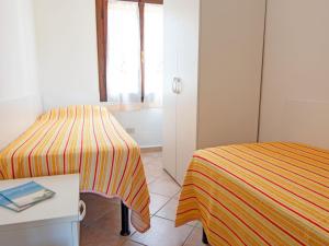 A bed or beds in a room at Apartment Villa Franca-2 by Interhome Még 11 kép