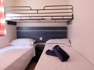 Posteľ alebo postele v izbe v ubytovaní Holiday Home Happy Easy by Interhome