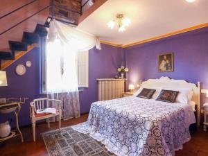 A bed or beds in a room at Apartment Appartamento Valle Verde by Interhome