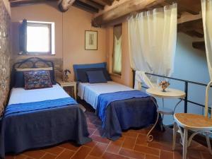 A bed or beds in a room at Apartment Appartamento Valle Verde by Interhome