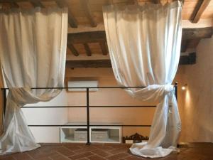 A bed or beds in a room at Apartment Appartamento Valle Verde by Interhome