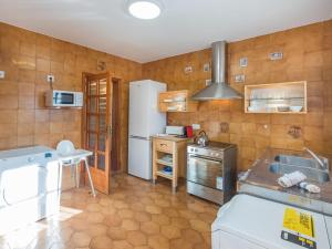 Kuchyň nebo kuchyňský kout v ubytování Villa Dofins Bahia Azul by Interhome + 18 fotografií