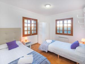 Postel nebo postele na pokoji v ubytování Villa Dofins Bahia Azul by Interhome