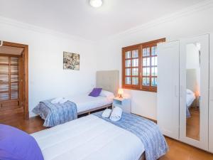 Postel nebo postele na pokoji v ubytování Villa Dofins Bahia Azul by Interhome