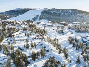 an aerial view of a ski resort in the snow at Holiday Home Kätkäläinen 5 e 3 by Interhome in Sirkka