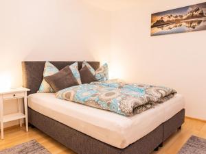 A bed or beds in a room at Apartment Ferienwohnung Sabine by Interhome