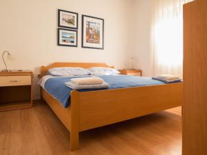 Postel nebo postele na pokoji v ubytování Holiday Home Dada by Interhome