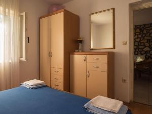 Postel nebo postele na pokoji v ubytování Holiday Home Dada by Interhome
