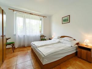 Ένα ή περισσότερα κρεβάτια σε δωμάτιο στο Holiday Home Edina - SZA115 by Interhome +19 φωτογραφίες