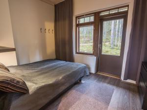 Postel nebo postele na pokoji v ubytování Holiday Home Karhunkieppi 9 b by Interhome