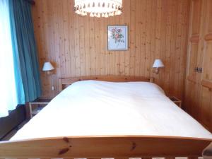 Postel nebo postele na pokoji v ubytování Apartment Centaure B RI 1 by Interhome + 10 fotografií