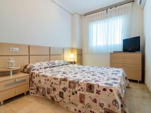 Postel nebo postele na pokoji v ubytování Apartment Jardines del Mar III - Marina d'Or-2 by Interhome