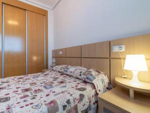 Postel nebo postele na pokoji v ubytování Apartment Jardines del Mar III - Marina d'Or-2 by Interhome