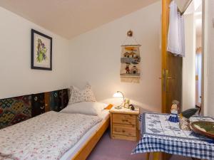 Postel nebo postele na pokoji v ubytování Apartment Berghaus Waldner by Interhome