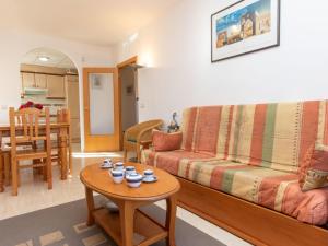 a living room with a couch and a table at Apartment Residencial Eurosol de los Monteros by Interhome in Miami Platja