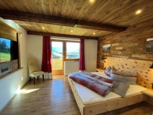 Televízia a/alebo spoločenská miestnosť v ubytovaní Apartment Manuel by Interhome