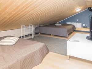 Postel nebo postele na pokoji v ubytování Holiday Home Villa sukka a by Interhome