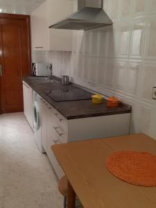 A kitchen or kitchenette at Casa El Reloj