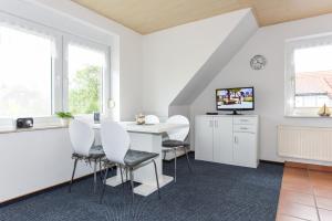 TV a/nebo společenská místnost v ubytování Ferienwohnung Trautes Heim