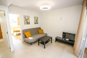 Posezení v ubytování New Miami Playa Apartamentos