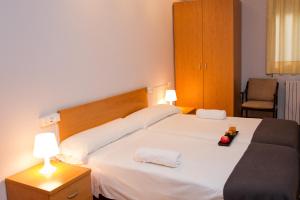 Postel nebo postele na pokoji v ubytování Hotel 139