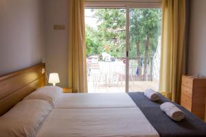Ένα ή περισσότερα κρεβάτια σε δωμάτιο στο Hotel 139