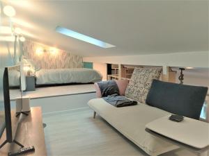 Posezení v ubytování La Mezzanine par Picardie Homes