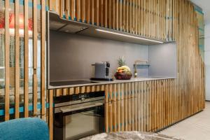 Küche/Küchenzeile in der Unterkunft Brucklyn Suites