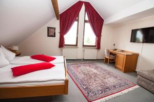 Postel nebo postele na pokoji v ubytování Hotel Janssen