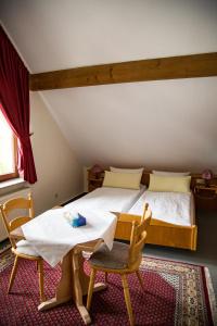 Postel nebo postele na pokoji v ubytování Hotel Janssen