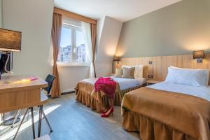 Krevet ili kreveti u jedinici u okviru objekta Hotel Resurs +37 fotografija