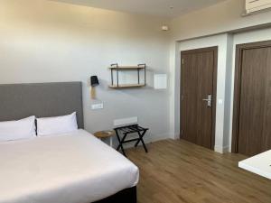 Posteľ alebo postele v izbe v ubytovaní Real Segovia Apartments by Recordis Hotels